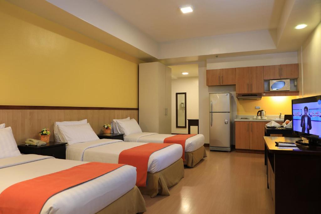 Studio Triple Deluxe Room